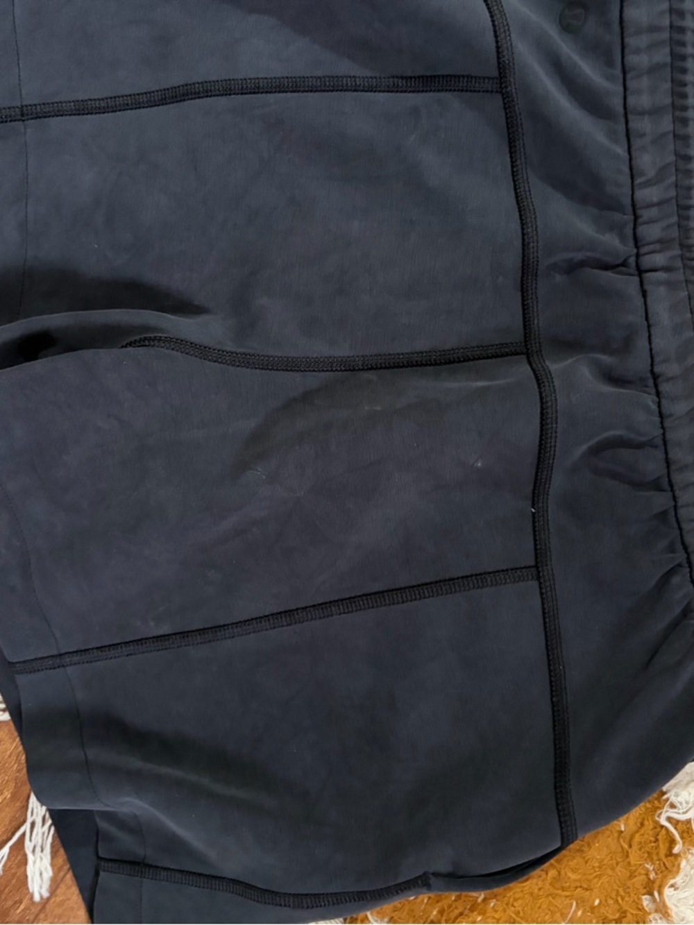 lululemon black high-waist performance shorts with stitched panels